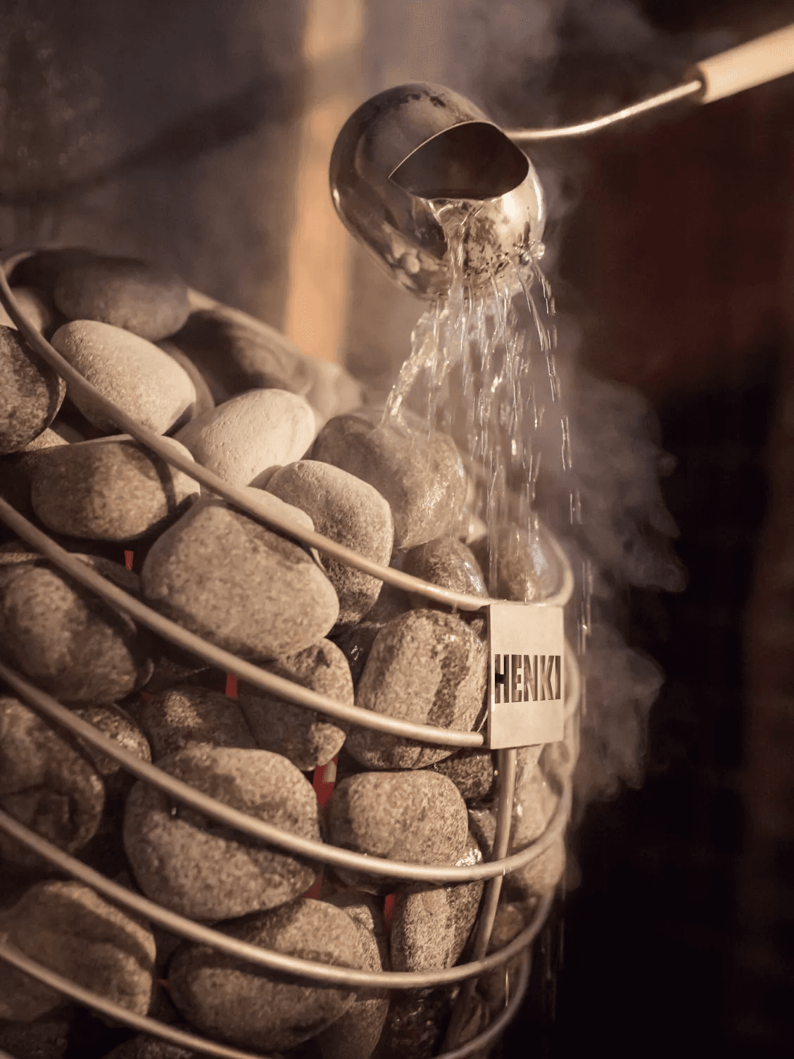Water poured onto hot sauna stones to create steam